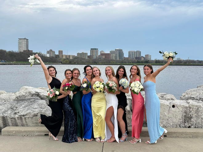 A group of Arrowhead High School students take prom photos along the shores of Lake Michigan in downtown Milwaukee on Saturday, April 27, 2024. The school's prom was held at the Brookfield Conference Center. SUBMIT YOUR 2024 PROM PHOTOS HERE TO BE INCLUDED
